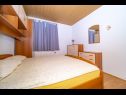 Apartments Zoran - 30 m from beach: A1(4) Postira - Island Brac  - Apartment - A1(4): bedroom