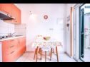 Apartments Ennio - 100m from the beach: A1 Narančasti(2+1), A2 Zeleni(2+1), A3 Žuti(2+1), SA4(2+1) Povlja - Island Brac  - Apartment - A1 Narančasti(2+1): kitchen and dining room