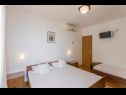 Apartments and rooms Vedra- free parking and close to the beach A1 (2+1), SA2 - B(2+1), C3 (2), D4 (2+1), E5 (2+1) Baska Voda - Riviera Makarska  - Apartment - D4 (2+1): bedroom