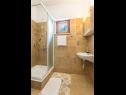 Apartments and rooms Vedra- free parking and close to the beach A1 (2+1), SA2 - B(2+1), C3 (2), D4 (2+1), E5 (2+1) Baska Voda - Riviera Makarska  - Apartment - A1 (2+1): bathroom with toilet