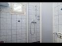 Apartments Krešo - 100 m from sea A1 desni(4), A2 lijevi(5), A3(2) Tkon - Island Pasman  - Apartment - A1 desni(4): bathroom with toilet