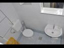 Apartments Petar - 6m from the sea: A1(4), A3(2) Barbat - Island Rab  - Apartment - A1(4): bathroom with toilet