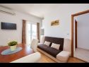 Apartments Mare - 30 m from pebble beach: SA1(2), SA2(2), A3(4), A4(4), A5(8) Seget Vranjica - Riviera Trogir  - Apartment - A3(4): living room
