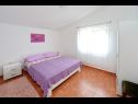 Apartments and rooms Aleksandra - 10 m from sea: A1 lijevi(2+2), A2 desni(2+2), A3(4+1), A4(2+2), R7(2), A5(4), A6(4+1) Bibinje - Zadar riviera  - Apartment - A2 desni(2+2): bedroom