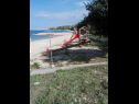 Apartments JoPek - sea view; SA1(2+1) Rtina - Zadar riviera  - children playground