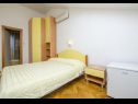 Apartments and rooms Mate 1 - 130 m from sea: A1 Zeleni(2+2), R1 Zuta(2), R2 Roza(2) Bol - Island Brac  - Room - R1 Zuta(2): bedroom