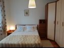 Apartments Mika - 150m from the sea A1(6), A2(4) Postira - Island Brac  - Apartment - A1(6): bedroom
