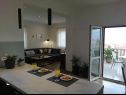 Apartments Mika - 150m from the sea A1(6), A2(4) Postira - Island Brac  - Apartment - A1(6): kitchen and dining room