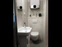 Apartments Mika - 150m from the sea A1(6), A2(4) Postira - Island Brac  - Apartment - A1(6): bathroom with toilet