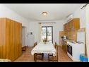 Apartments Gogi - 130 m from sea: SA2(2), A1(2) Postira - Island Brac  - Apartment - A1(2): kitchen and dining room