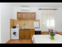 Apartments Gogi - 130 m from sea: SA2(2), A1(2) Postira - Island Brac  - Apartment - A1(2): kitchen and dining room