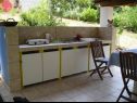 Apartments Tomi - 120m from the sea: A1(4+2) Postira - Island Brac  - summer kitchen