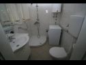 Apartments Tomi - 120m from the sea: A1(4+2) Postira - Island Brac  - Apartment - A1(4+2): bathroom with toilet