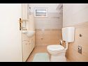 Apartments Žana - close to beach: A1(5+1) Veliki, A2(3) Mali Arbanija - Island Ciovo  - Apartment - A1(5+1) Veliki: bathroom with toilet