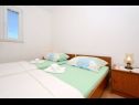 Apartments Sima - 100m from beach: A1(4+1), A2(2+2), A3(4+2), A4 (2+2) Mastrinka - Island Ciovo  - Apartment - A1(4+1): bedroom