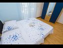 Apartments Ljuba - nice garden: A2(4+1) Plavi, A3(4+1) Ljubicasti, A4(8+1) Okrug Gornji - Island Ciovo  - Apartment - A2(4+1) Plavi: bedroom
