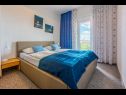 Apartments Colorful - modern Apartments: SA1 zuti(2), A2 ljubicasti(4+2), A3 narancasti(2+1), SA4 crveni(2+1), A5 plavi(4+1), A6 zeleni(2+1), A7 rozi(2+2) Crikvenica - Riviera Crikvenica  - Apartment - A5 plavi(4+1): bedroom
