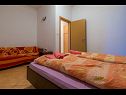 Apartments Tomica - open pool: A1 veliki(4+2), A2 mali(2+1), A3 dvosobni(5+1), A5 donji(2+3), A4 dvoetažni(4+3) Novi Vinodolski - Riviera Crikvenica  - Apartment - A5 donji(2+3): bedroom