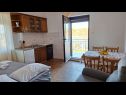 Apartments Zvone - at the water front: A2(4), A1(2+2) Veli Rat - Island Dugi otok  - Apartment - A1(2+2): kitchen and dining room
