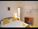Apartments Vibo - parking and barbecue: A1 Vinka 1(6), A3 Vinka 3(2), A5 Vinka 4(5), A2 Vinka 2(4) Jelsa - Island Hvar  - Apartment - A1 Vinka 1(6): bedroom