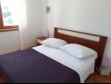 Apartments Dioniza - 150 m from beach: A1(2+2), A2(3), A3(2+2) Jelsa - Island Hvar  - Apartment - A1(2+2): bedroom