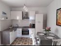Apartments Dioniza - 150 m from beach: A1(2+2), A2(3), A3(2+2) Jelsa - Island Hvar  - Apartment - A1(2+2): kitchen and dining room
