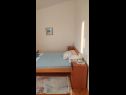 Apartments Mirjana: sea view & balcony: A1 MN (2+1), A2 JN (2+1) Baska Voda - Riviera Makarska  - Apartment - A1 MN (2+1): bedroom