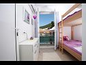 Apartments Rilka - 20m from the sea: A1(4) Baska Voda - Riviera Makarska  - Apartment - A1(4): bedroom