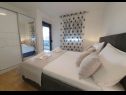 Apartments Villa Esse - heated pool & seaview: A1(2+2), A2(4+2), A3(2+2), A4(4+2), A5(2+2) Baska Voda - Riviera Makarska  - Apartment - A5(2+2): bedroom