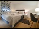Apartments Villa Esse - heated pool & seaview: A1(2+2), A2(4+2), A3(2+2), A4(4+2), A5(2+2) Baska Voda - Riviera Makarska  - Apartment - A5(2+2): bedroom