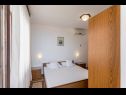 Apartments and rooms Vedra- free parking and close to the beach A1 (2+1), SA2 - B(2+1), C3 (2), D4 (2+1), E5 (2+1), R1(2) Baska Voda - Riviera Makarska  - Apartment - D4 (2+1): bedroom