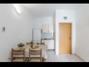 Apartments and rooms Vedra- free parking and close to the beach A1 (2+1), SA2 - B(2+1), C3 (2), D4 (2+1), E5 (2+1), R1(2) Baska Voda - Riviera Makarska  - Apartment - E5 (2+1): kitchen and dining room