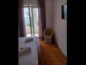 Apartments Josip - 150 m from beach with free parking A1(3), A2(5), A3(2+2) Baska Voda - Riviera Makarska  - Apartment - A2(5): bedroom