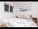 Apartments Sonja - 100 m from sea: A1(2+2), A2(4), SA3(2+1), SA5(2) Brela - Riviera Makarska  - Apartment - A1(2+2): bedroom