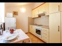Apartments and rooms Led - near sea: SA1(2), A2(2+2), A3(2+2), R4(2), R5(2), A6(2+1), A7(2+2) Brela - Riviera Makarska  - Apartment - A6(2+1): kitchen and dining room