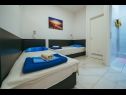 Apartments Lovre - close to the sea : A1(6), A2(4+1) prizemlje, A3(5) Brela - Riviera Makarska  - Apartment - A2(4+1) prizemlje: bedroom