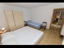 Apartments Miljko A1(6), SA2(2), A10(4+1), A11(2+2) Brela - Riviera Makarska  - Apartment - A1(6): bedroom