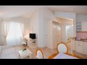 Apartments Beachfront luxury condos : SA1(2+1), SA2(2), A3(2+2), A4(2+2), SA5(2+2), SA6(2+1), A7(2+2), A8(2+2), A9(2+1), R10(2), A11(2+2), A12(2+2) Brela - Riviera Makarska  - Apartment - A4(2+2): kitchen and dining room