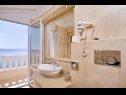 Apartments Beachfront luxury condos : SA1(2+1), SA2(2), A3(2+2), A4(2+2), SA5(2+2), SA6(2+1), A7(2+2), A8(2+2), A9(2+1), R10(2), A11(2+2), A12(2+2) Brela - Riviera Makarska  - Apartment - A4(2+2): bathroom with toilet