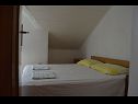 Apartments Jozo - 150 m from pebble beach: A1(2), A2(2), A3(2), A4(4), A5(4) Gradac - Riviera Makarska  - Apartment - A5(4): bedroom