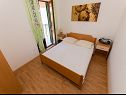 Apartments Srzi A1(7+1), SA2(2), A3(2+1), A4(2+2), A5(4+1) Makarska - Riviera Makarska  - Apartment - A5(4+1): bedroom