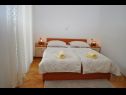 Apartments and rooms Ljuba - 130 meter from sea SA1(2), SA2(2+1), SA6(2+1), A4(2+1), R3(2+1), R7(2+1) Makarska - Riviera Makarska  - Apartment - A4(2+1): bedroom