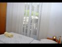 Apartments and rooms Ljuba - 130 meter from sea SA1(2), SA2(2+1), SA6(2+1), A4(2+1), R3(2+1), R7(2+1) Makarska - Riviera Makarska  - Apartment - A4(2+1): bedroom