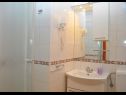 Apartments and rooms Ljuba - 130 meter from sea SA1(2), SA2(2), SA6(2), A4(2+1), R3(2+1), R7(2+1) Makarska - Riviera Makarska  - Room - R3(2+1): bathroom with toilet