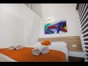 Apartments Maka - city centar: A1(4+2), A2(2+2), A3(4+2), A4(2+2), A5(4+2), A6(4+1) Makarska - Riviera Makarska  - Apartment - A5(4+2): bedroom