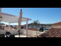 Apartments Edita - terrace with sea view and sunchaires Leut 2 (7) Jezera - Island Murter  - house