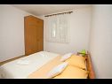 Apartments Petar - free parking A1(3+1), A2(5) Dugi Rat - Riviera Omis  - Apartment - A1(3+1): bedroom