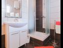 Apartments Mari - sea view apartments: A1(2) Borna, A2(4) Iva, A3(4) Silver, A4(4) Red Nemira - Riviera Omis  - Apartment - A1(2) Borna: bathroom with toilet