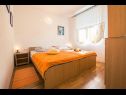 Apartments Mari - sea view apartments: A1(2) Borna, A2(4) Iva, A3(4) Silver, A4(4) Red Nemira - Riviera Omis  - Apartment - A1(2) Borna: bedroom