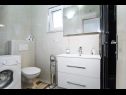 Apartments Dusa - with pool; A1 - I kat(4+2), A2 - II kat(4+2), A3 - III kat(4) Pisak - Riviera Omis  - Apartment - A3 - III kat(4): bathroom with toilet